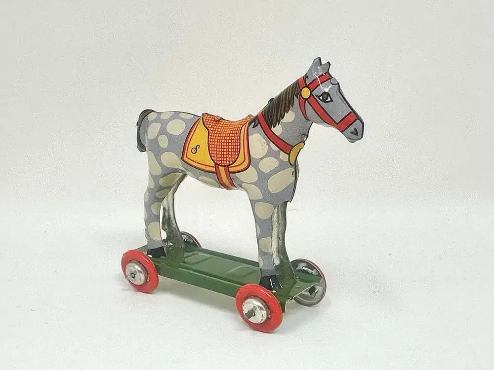 Miniature Tin Toy Horse on Wheels Vintage Penny Toy Ornament by Schylling